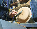 turning a wooden bowl on a lathe